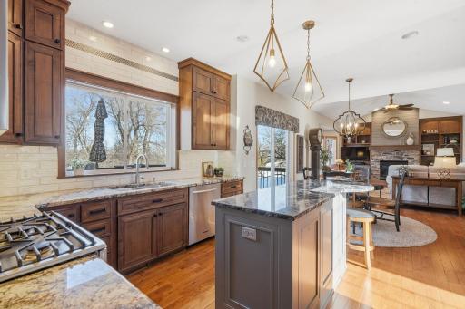 A desirable open floor plan, filled with light and gleaming hardwood floors.