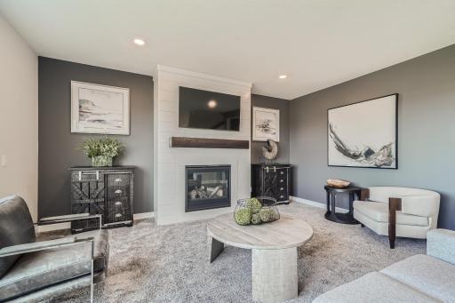 Photo is of the model. This modern fireplace is an extraordinary room accent. Enjoy the warmth of this gas fireplace as you relax in the great room.