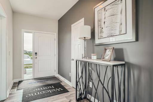 Photo is of the model. Make the best first impression with this bright and open foyer. Thoughtfully-designed to leave plenty of room for your guests to arrive and feel comfortable.