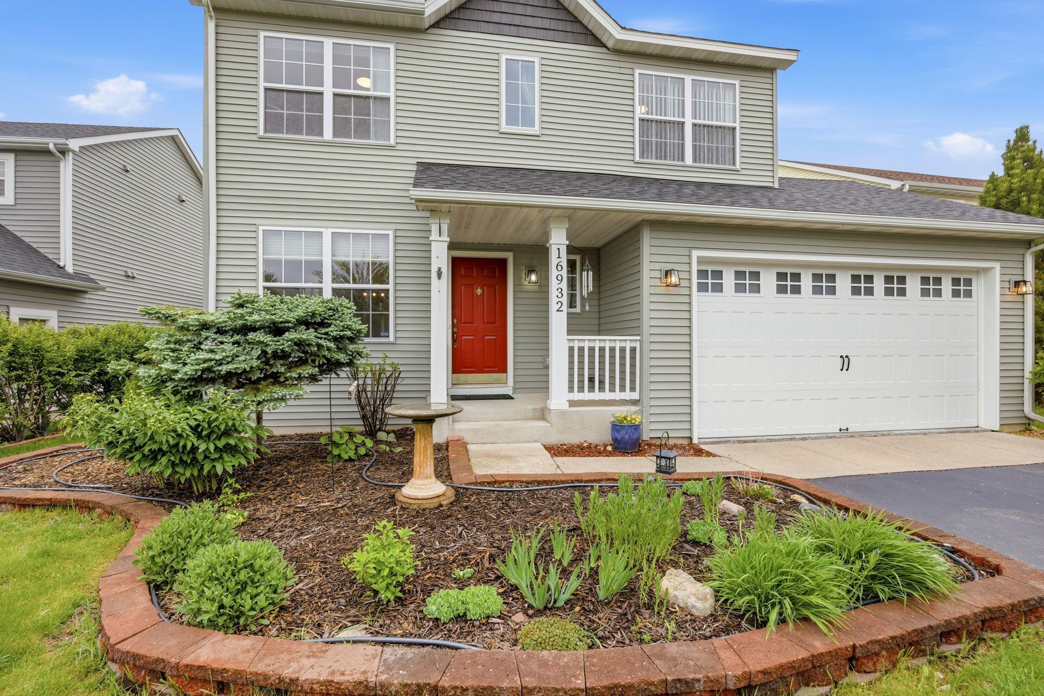 Landscaping is done (or you can add more) - enjoy watching what pops up and the birds that stop by!