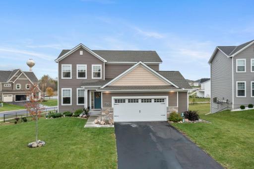 This home includes an asphalt driveway and a 2.5 stall garage.
