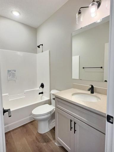 A full bath centers the 2 bedrooms but still located near the the living room.