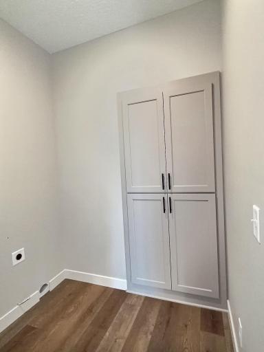Additional built in cabinet in the laundry room for extra storage in the home.
