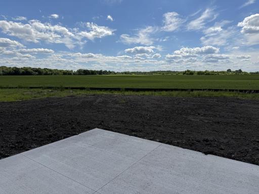 The back patio will have open countryside and sunsets views to boot!!