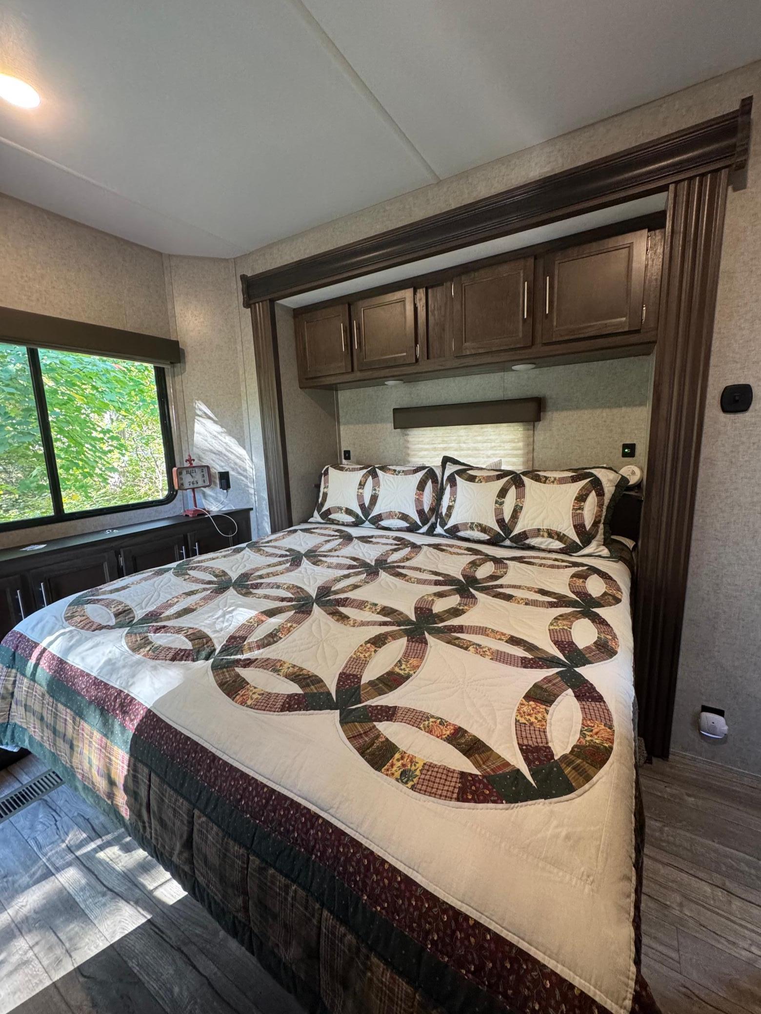 KING SIZE bed in a second slide out offers all the comforts of home!