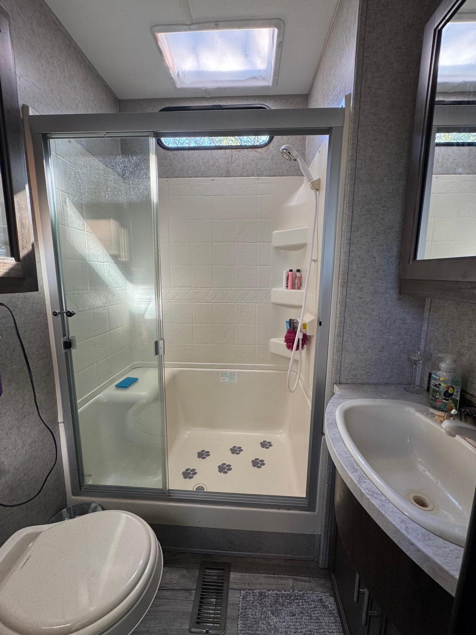 3/4 bath with a large walk in shower