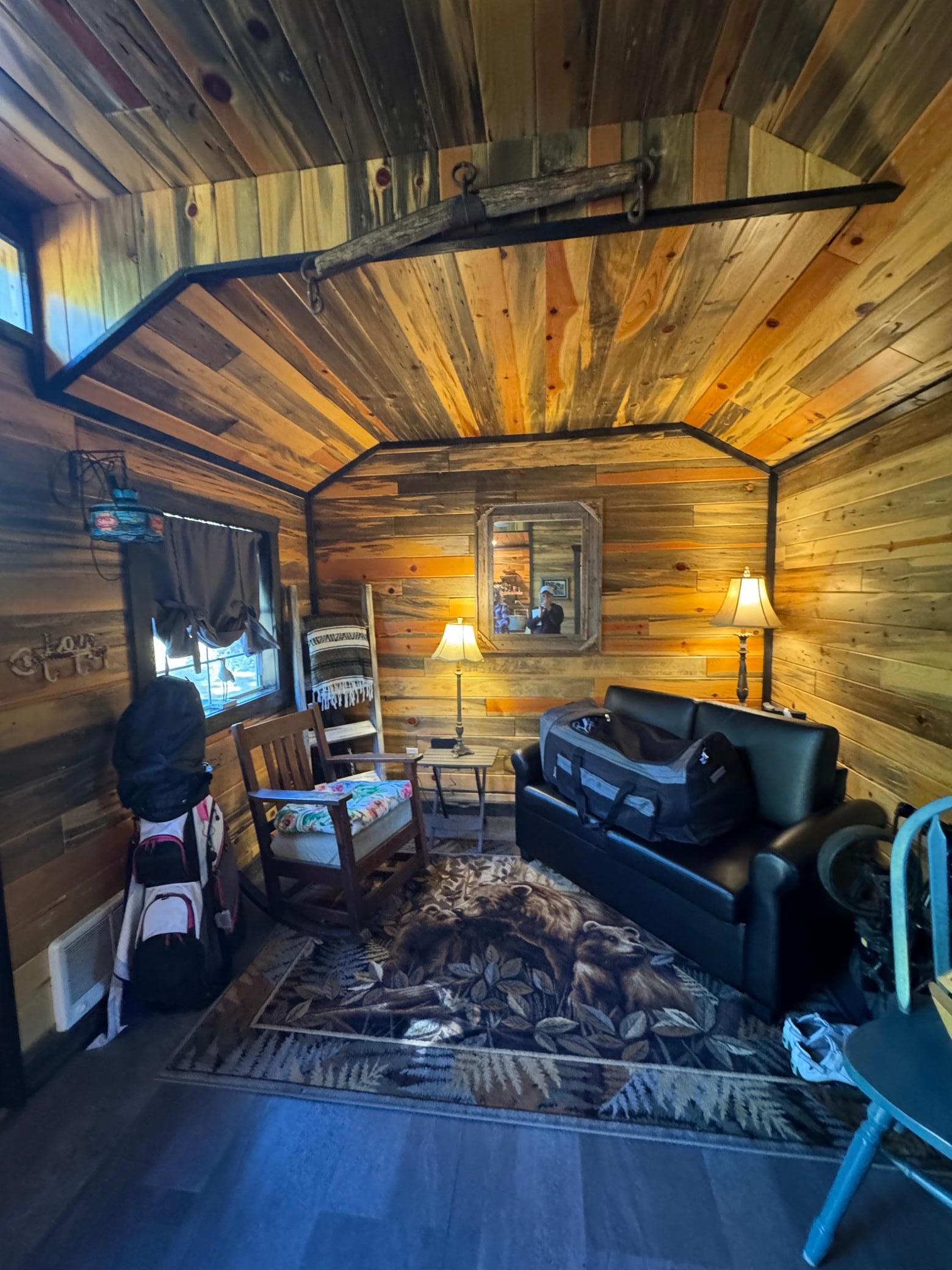 Inside you will fins a gorgeous finished bunkhouse with barn wood, LVP flooring and so much more!