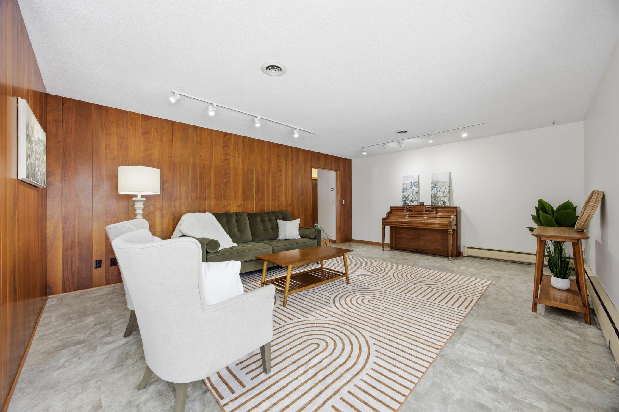 Living Room features gorgeous wood paneling