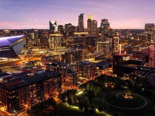 Photo for 1111 W River Parkway, 33A, Minneapolis, MN 55415 - listing #6804934 Stunning skyline view at night with vibrant city lights.