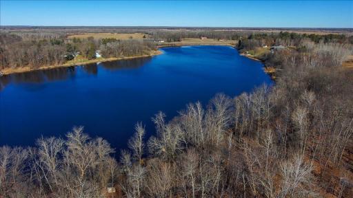Aerial view of beautiful Dogfish Lake showcasing the peaceful water setting and natural surroundings near this private Aitkin lake property.