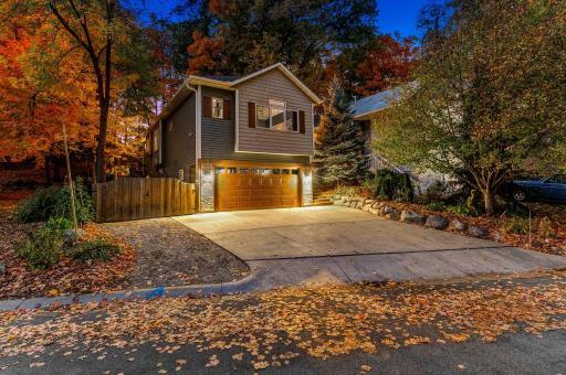 Photo for 3041 Inverness Lane, Mound, MN 55364 - listing #6805147 Nestled beneath a canopy of mature trees halfway down a dead-end cul-de-sac, this lovingly maintained and significantly updated property offers a rare blend of natural serenity, usable backyard space, and modern comfort.