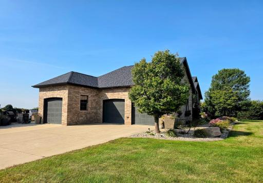 Property has convenient 3 stall attached garage, plus security cameras, & for added security for your dogs, an underground invisible dog fence with 2 collars.