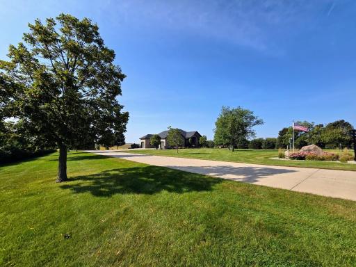 You will love the wonderful long concrete driveway! Plus 111th St is a hard top/paved road. (No dust on your vehicles!)