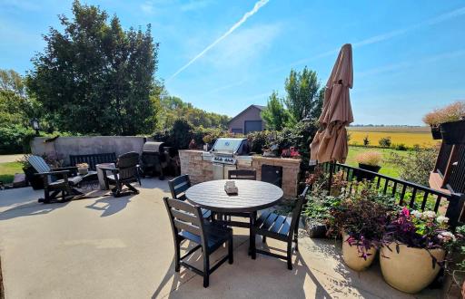 You will enjoy grilling morning, noon, or evening at this outdoor kitchen station.