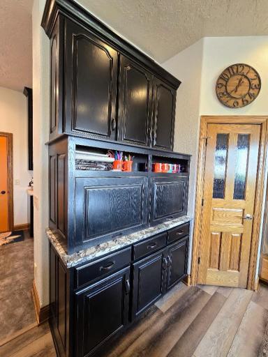 Updated kitchen remodel in 2022. Coffee bar area and spacious walk in pantry were added.