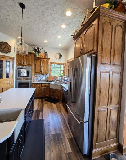 Custom made Country Cupboards, Cambria Quartz counter top, newer high end stainless steel appliances, farmhouse sink, spacious pantry, indoor grill, so many wonderful updates!