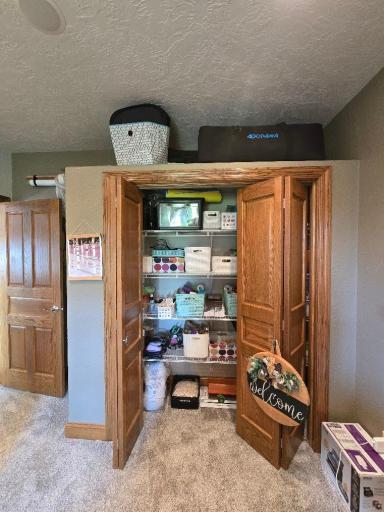 Spacious closet with shelving, can be removed to be used for hanging clothes