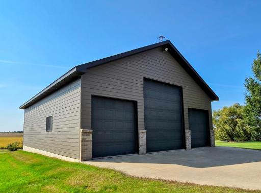 Utility shed is stick frame built with a foundation. Concrete floor, electric, & new 30 year shingles in 2023. Shed measures 36 x 42 Doors 14 H x 12 W