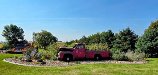 Unique landscaping on westside of property where septic tank is located.