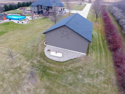 Propane tank located behind shed. (services-fireplaces, pool, in&outdoor grills. Shed not heated.