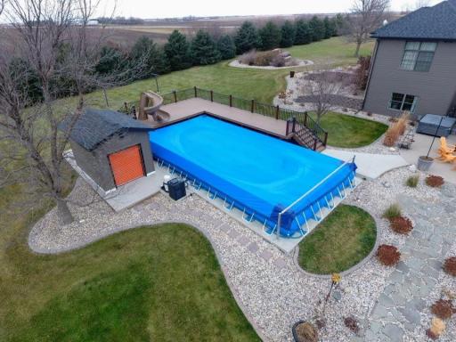 Pool shed & composite decking around 20x 40 above ground heated pool