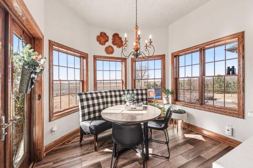 Dining area nook with so much natural southern sunlight. Perfect place to enjoy your morning coffee!