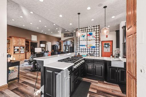 Chef's kitchen! Gas stove top, plenty of countertop space, prep sink, and so much storage!