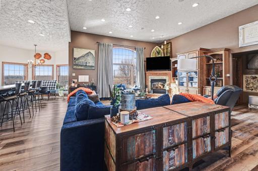 Living room has open concept -plenty of recessed lighting- so much to love!