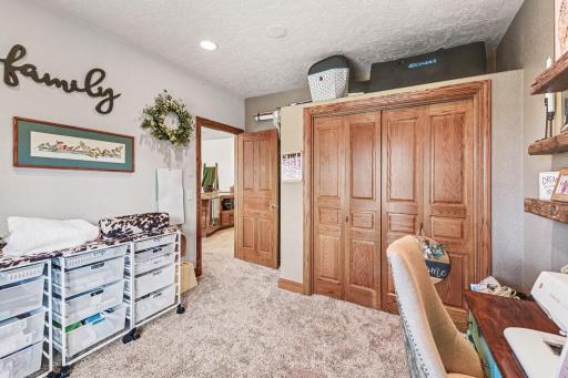 Basement SE bedroom currently used as craft room. Seller just installed new carpeting