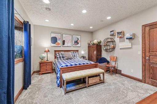Spacious bedroom with very large walk in closet and egress window.