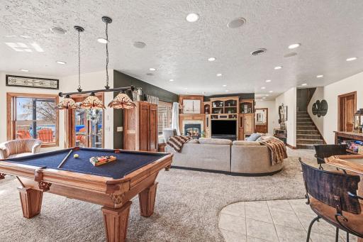 Walk out basement -This basement features family room area, wet bar, pool table, & sitting area.