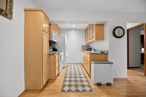 updated, functional galley kitchen, ample cabinet storage
