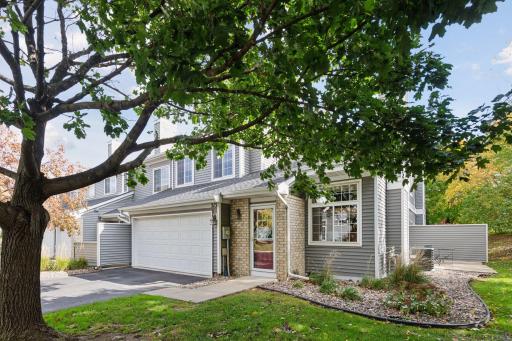 Photo for 513 Mission Hills Way W, Chanhassen, MN 55317 - listing #6805225 Inviting end-unit townhome with mature trees and private south-west facing views in the Mission Hills neighborhood of Chanhassen