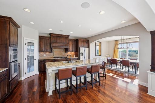 This kitchen has it all. From a large center island, surplus of cabinet space, pantry storage, to beautiful finishes throughout.
