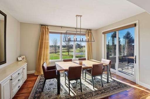 Dining area with access to the deck. Perfect for gatherings that are indoor and outdoor!