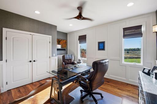 Third bedroom on the main floor that has multiple ways to be used. Here it is used as an office but it could be a bedroom. 3 bedrooms on the main floor, such a great quality of this home!
