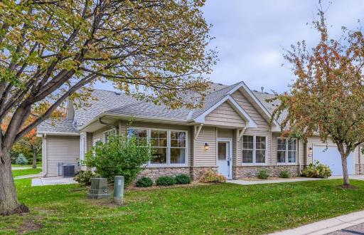 Townhome living on a corner lot with over 1500 feet of one level living.