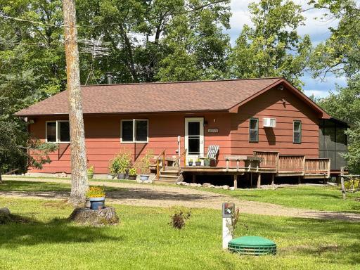 Nestled "in the woods" and at water's edge, this year-round home can be your cabin getaway property your new home!