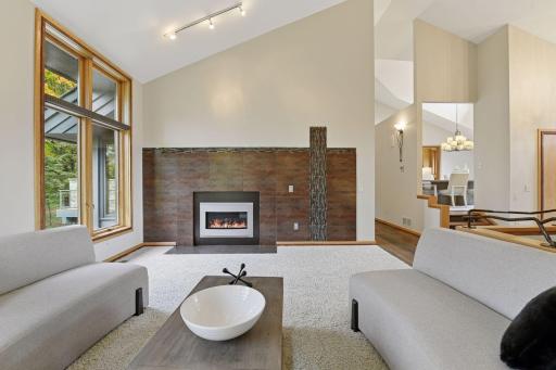 Experience the grandeur of vaulted ceilings that elevate the living space