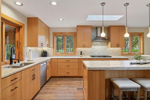 The large center island is ideal for meal prep or grabbing a quick bite to eat