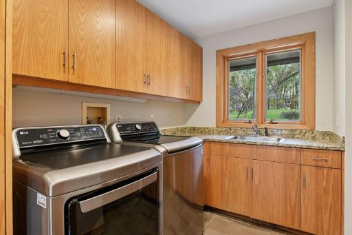 Spacious laundry room is located on the main level