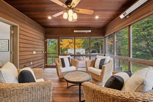 Enjoy the views of nature from the protection of the screen porch