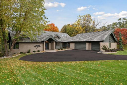 Three car garage and newly seal-coated driveway