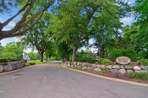 Boulder Bridge Farms boasts an array of exceptional amenities including tennis courts, storage barn, beach access, docks on Lake Minnetonka, and more!