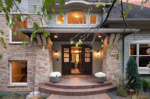 . Step through the front door into an open-concept main floor designed for both everyday living and sophisticated entertaining.