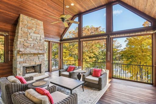 Completing the main floor is a dedicated home office and screened porch with fireplace.
