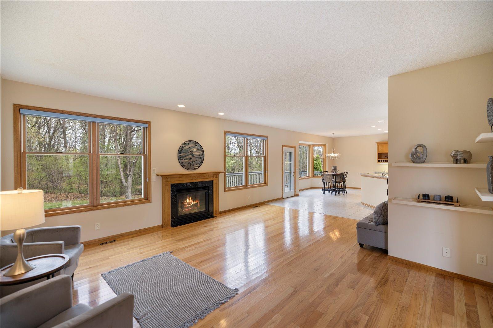 Great Room overlooks backyard and features gas fireplace