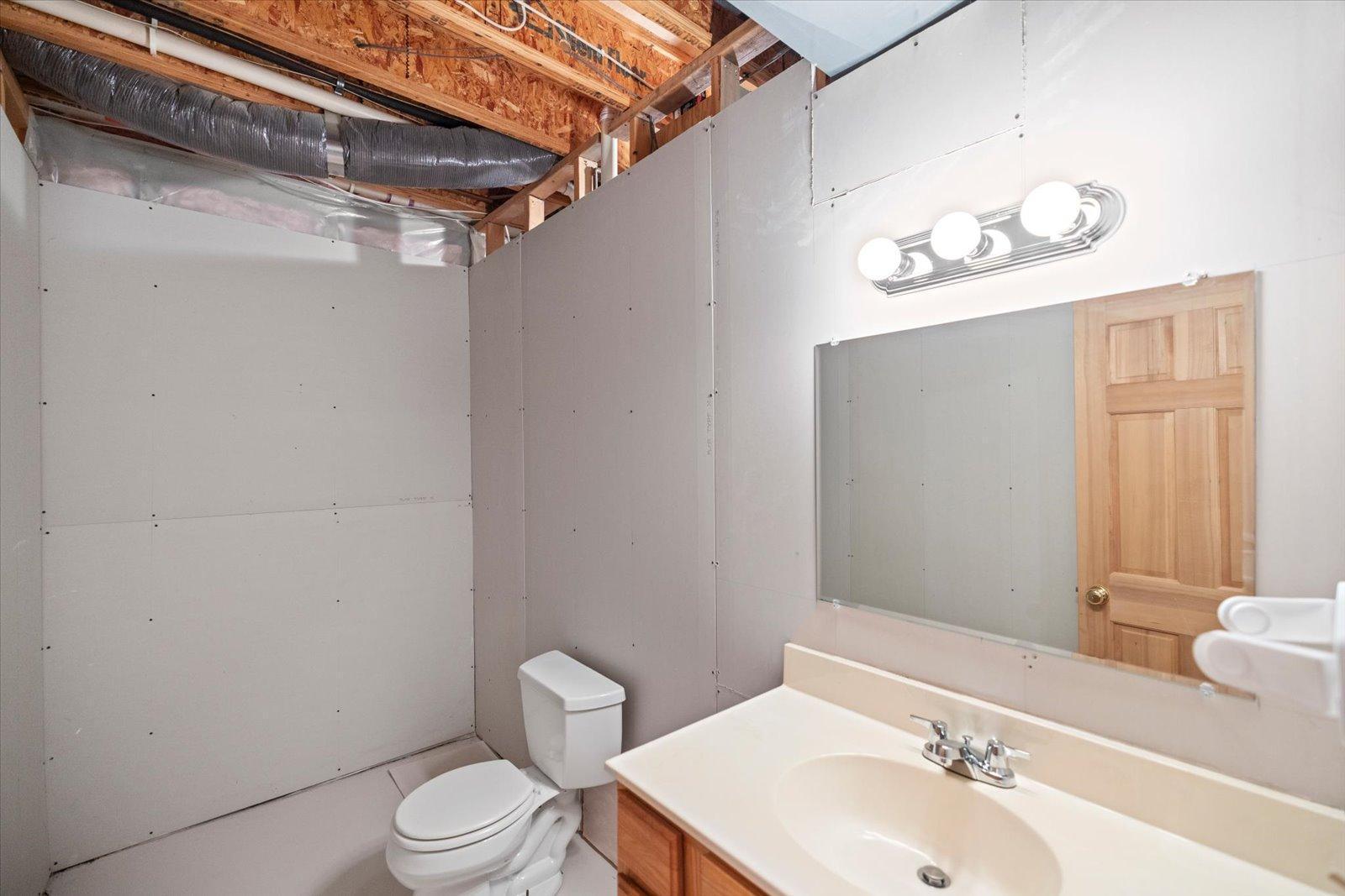 Half bath on lower level partially finished.jpg