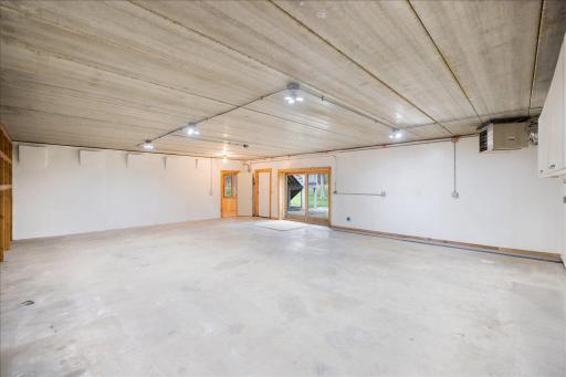 Lower level heated workshop/garage with 3 spaces