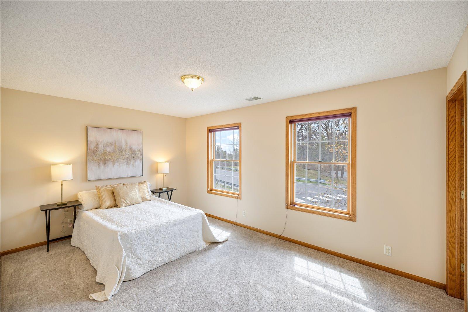 Second upper level bedroom with walk in closet